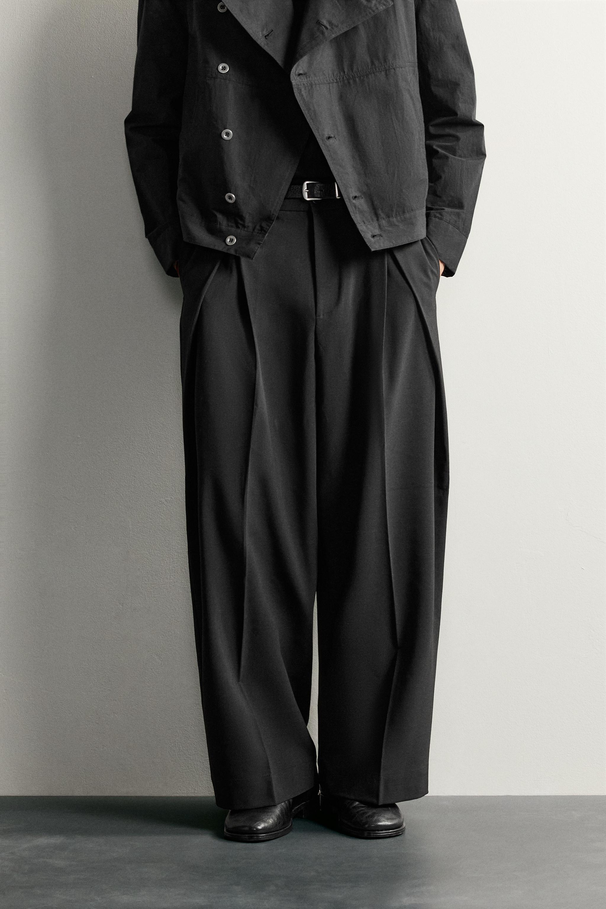 RELAXED-FIT PLEATED PANTS
